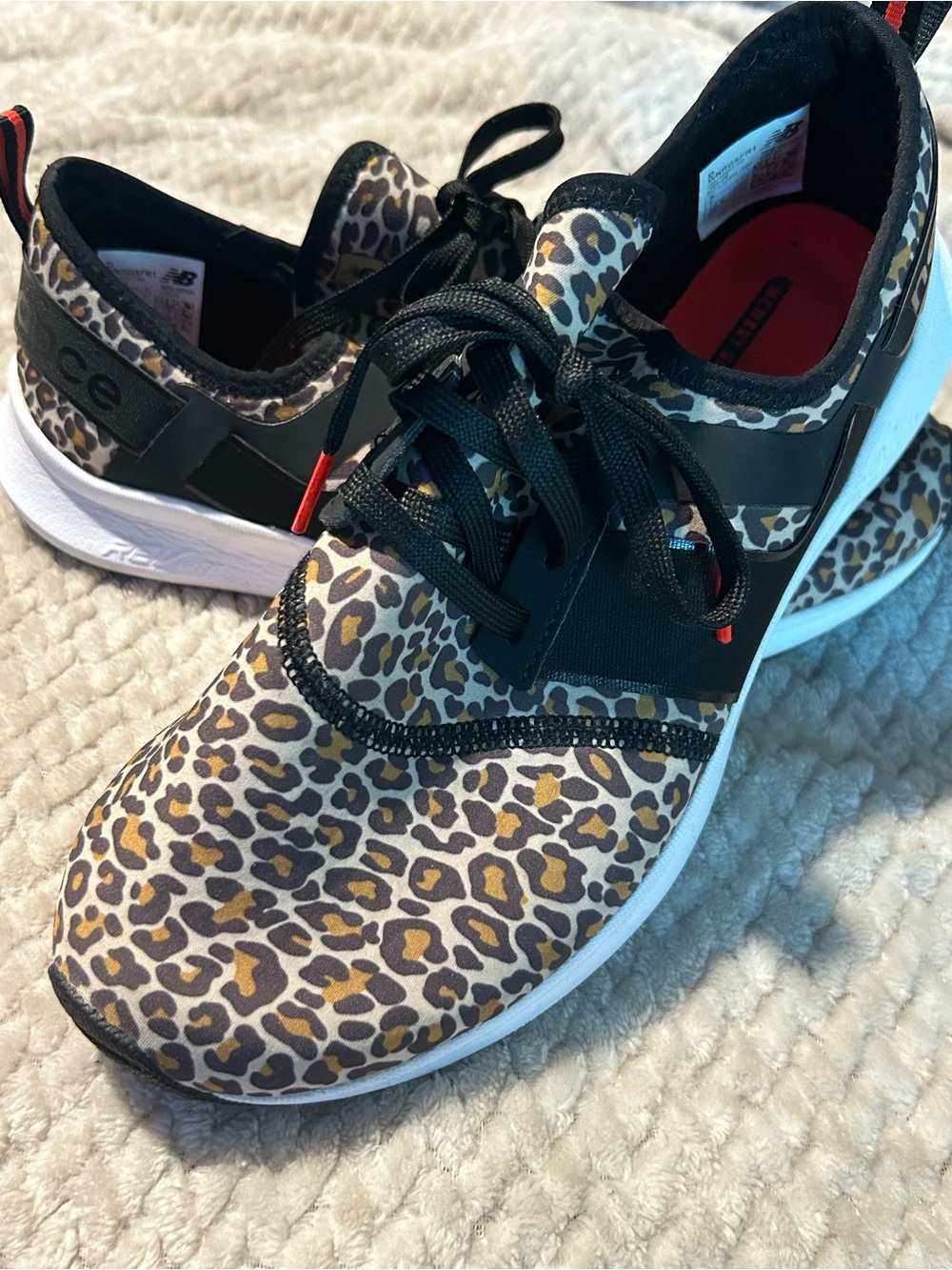 New Balance Women’s Leopard Print Athletic Sneakers